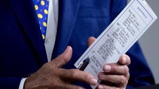 The notes of Democratic presidential candidate former Vice President Joe Biden reference Sen. Kamala Harris, D-Calif., among other things as he speaks at a campaign event at the William "Hicks" Anderson Community Center in Wilmington, Del., Tuesday, July 28, 2020.