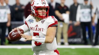 Miami RedHawks quarterback Brett Gabbert (5) looks for a receiver during the Mid-American Conference championship game between the Miami (Ohio) RedHawks and the Central Michigan Chippewas on December 7, 2019