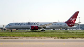 A Virgin Atlantic charter flight lands at Heathrow Airport, London, delivering vital medical supplies to UK from Shanghai.