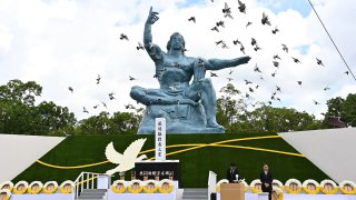 Doves fly during a ceremony marking the 75th anniversary of the atomic bombing of Nagasaki, at the Nagasaki Peace Park on August 9, 2020.