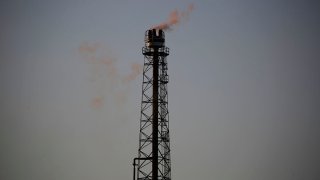 Emissions rise from the Royal Dutch Shell Plc Norco Refinery in Norco, Louisiana, June 12, 2020.