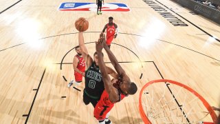 Jayson Tatum #0 of the Boston Celtics dunks the ball against the Toronto Raptors