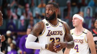 LeBron James #23 of the Los Angeles Lakers looks on during the game against the Houston Rockets during Game Five of the Western Conference SemiFinals of the NBA Playoffs on September 12, 2020 at AdventHealth Arena in Orlando, Florida