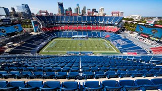 Players warm up before a game at Nissan Stadium on Sept. 20, 2020, in Nashville, Tenn.