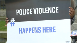 Police Violence Happens Here Sign