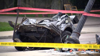 A wrecked vehicle in Boston's Hyde Park neighborhood