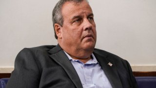 Former New Jersey Governor Chris Christie listens as U.S. President Donald Trump speaks during a news conference in the Briefing Room of the White House on September 27, 2020 in Washington, DC. Trump is preparing for the first presidential debate