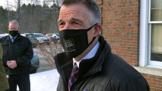 Vermont Republican Gov. Phil Scott speaks to reporters after voting on Tuesday, Nov. 3, 2020, in his hometown of Berlin, Vt. Scott said he voted for Democrat Joe Biden for president because he believes the former vice president can do more to bring the country together. He said it was the first time in his life he's voted for a Democrat.