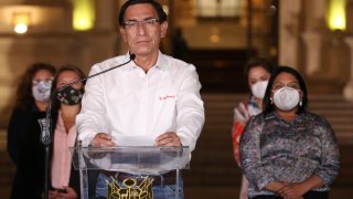 Peru's President Martin Vizcarra speaks in front of the presidential palace after lawmakers voted to remove him from office in Lima, Peru, Monday, Nov. 9, 2020. Lawmakers voted to impeach Vizcarra, accusing him of taking bribes years ago and poorly handling the country's response to the coronavirus pandemic.