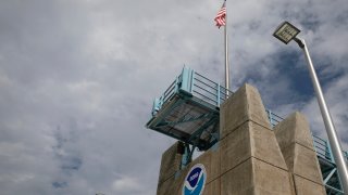 MIAMI, FL - AUGUST 29: The logo of National Oceanic and Atmospheric Administration (NOAA) is seen at the Nation Hurricane Center on August 29, 2019 in Miami, Florida. Hurricane Dorian is expected to become a Category 4 as it approaches Florida in the upcoming days.