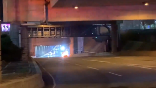 A car on fire at Boston Logan International Airport.