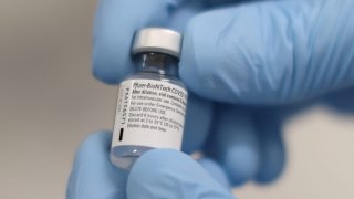 A vial of the Pfizer/BioNTech COVID-19 vaccine is seen ahead of being administered at the Royal Victoria Hospital in Belfast, Northern Ireland December 8, 2020.