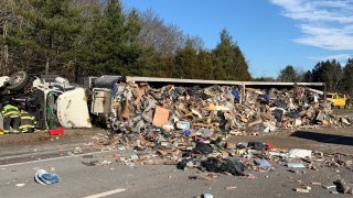 A photo from Massachusetts State Police shows a tractor-trailer crash on I-93 in Canton.