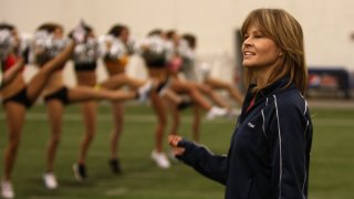 This March 21, 2012, file photo shows New England Patriots Cheerleading Director Tracy Sormanti lead candidates at the Dana Farber Field House during Patriots Boot Camp.