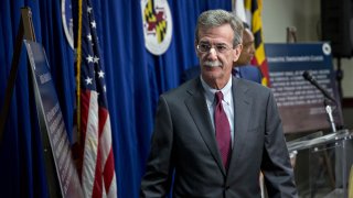 Brian Frosh, Maryland attorney general, exits after a news conference in Washington, D.C., U.S., on Monday, June 12, 2017. President Donald Trump's continued financial stake in his global business empire, violates the U.S. Constitution's prohibition on profiting from his office, Maryland and the District of Columbia said in a federal lawsuit.