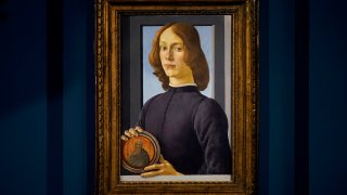 Sandro Botticelli's "Young Man Holding a Roundel" is displayed at Sotheby's in New York