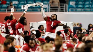 Ben Davis #1 of the Alabama Crimson Tide celebrates as the Alabama Crimson Tide defeat the Ohio State Buckeyes 52-24 in the College Football Playoff National Championship game at Hard Rock Stadium on January 11, 2021 in Miami Gardens, Florida.