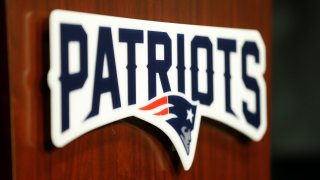 Jan 17, 2018; Foxborough, Massachussetts, USA; New England Patriots logo on the podium during the AFC Championship Game press conference at Gillette Stadium. Mandatory Credit: Greg M. Cooper-USA TODAY Sports