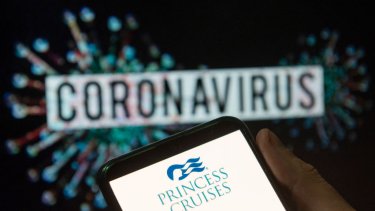 File Image: In this photo illustration the cruise line company Princess Cruises logo seen displayed on a smartphone with a computer model of the COVID-19 coronavirus on the background. (Photo by Budrul Chukrut/SOPA Images/LightRocket via Getty Images)