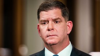 BOSTON, MA – JANUARY 12: Boston Mayor Marty Walsh Walsh tears up while delivering the State of the City on Tuesday evening at the Roxbury Branch of the Boston Public Library in Boston on Jan. 12, 2021. President-elect Joe Biden has chosen Boston Mayor Martin J. Walsh as his nominee for labor secretary, tapping a longtime friend and former union president for the Cabinet position in what would mark a seismic shift in the citys politics, his presidential transition team announced Thursday. (Photo by Erin Clark/The Boston Globe via Getty Images)