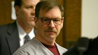 SEATTLE - DECEMBER 18: Gary Ridgway prepares to leave the courtroom where he was sentenced in King County Washington Superior Court December 18, 2003 in Seattle, Washington. Ridgway received 48 life sentences, with out the possibility of parole, for killing 48 women over the past 20 years in the Green River Killer serial murder case.
