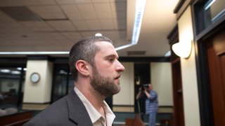 Dustin Diamond walks out of the coutroom after a split verdict in an Ozaukee County Courthouse May 29, 2015 in Port Washington, Wisconsin.