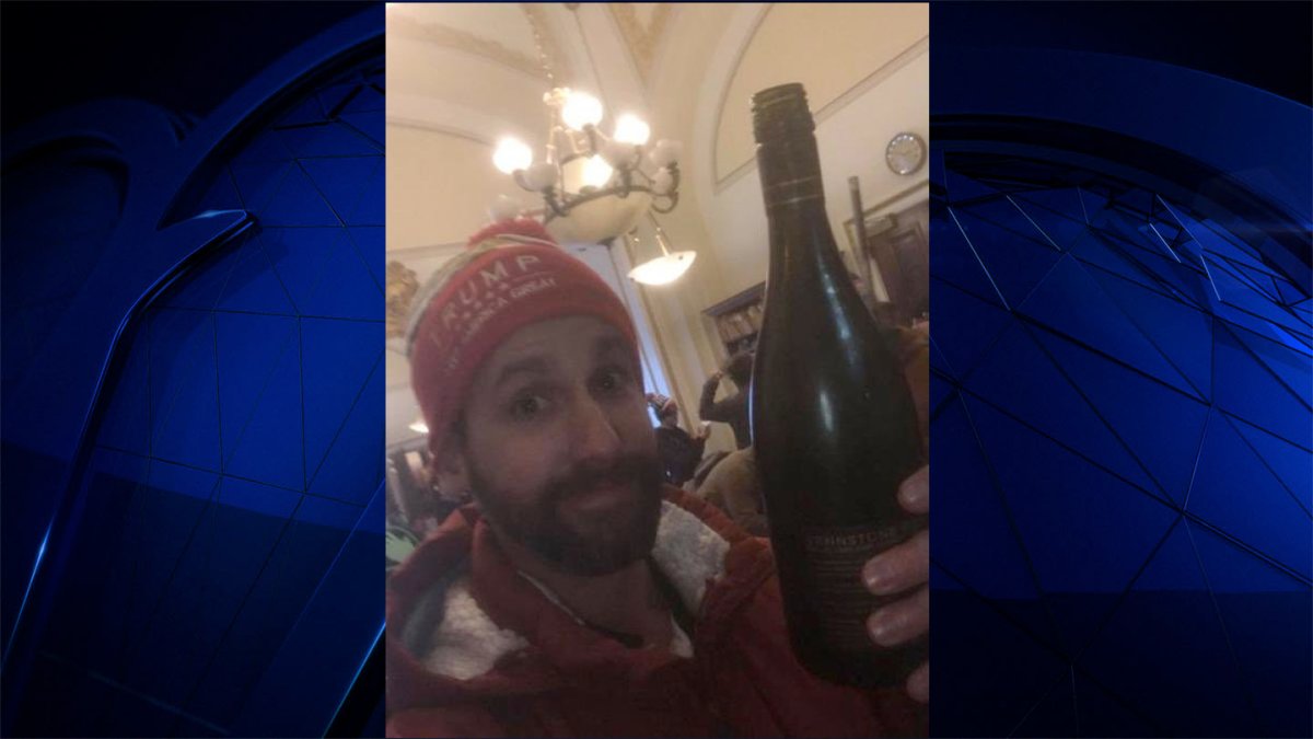 NH Man Who ‘Chugged’ Glass of Wine Amid Capitol Riot Says He Has No