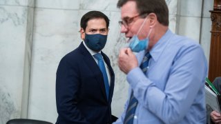 UNITED STATES - JUNE 24: Acting Chairman Sen. Marco Rubio, R-Fla., left, and vice chairman Sen. Mark Warner, D-Va., arrive for the Senate Select Intelligence Committee confirmation hearing for Peter Michael Thomson, nominee to be inspector general of the Central Intelligence Agency, in Russell Building on Wednesday, June 24, 2020.