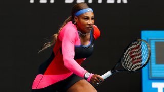 United States' Serena Williams runs to return a shot to Germany's Laura Siegemund during their first round match at the Australian Open tennis championship in Melbourne, Australia, Monday, Feb. 8, 2021.