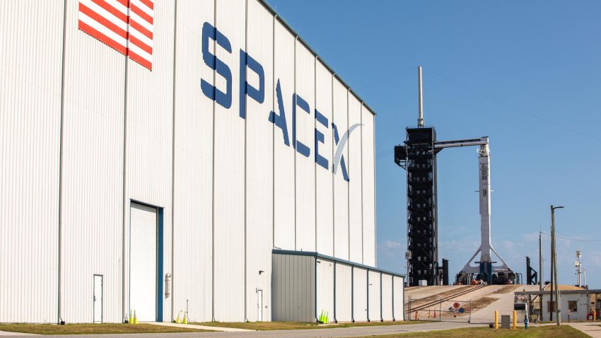 The SpaceX Falcon 9 rocket and Crew Dragon capsule stand upright on the launchpad at NASA’s Kennedy Space Center ahead of the Demo-2 launch.