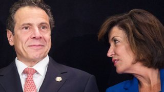 New York Governor Andrew M. Cuomo (L) and running mate Lt. Gov. nominee Kathy Hochul take part in a campaign stop at the New York Hotel & Motel Trades Council a day ahead of the Democratic primary in Midtown, New York on September 8, 2014.
