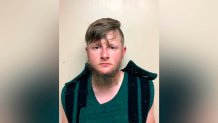 This booking photo provided by the Crisp County Sheriff's Office shows Robert Aaron Long on Tuesday, March 16, 2021. Long was arrested as a suspect in the fatal shootings of multiple people at three Atlanta-area massage parlors, most of them women of Asian descent, authorities said. (Crisp County Sheriff's Office via AP)