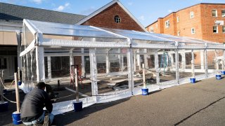 Outdoor dining tents under constructions in Arlington, Virginia, on Feb. 5, 2021.