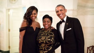 Former White House intern turned Social Secretary Deesha Dyer with the Obamas.