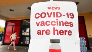 A woman enters a CVS Covid-19 vaccine site in Monterey Park, California on April 27, 2021.