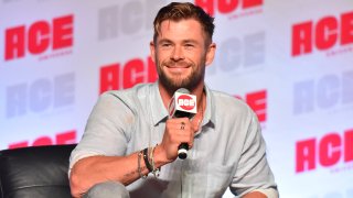 In a Sunday, Oct. 13, 2019 file photo, Chris Hemsworth participates during a Q&A panel on day three at the Ace Comic-Con in Rosemont, Ill. Elton John and Chris Hemsworth are among the celebrities donating big bucks to help aid the efforts for the engulfing wildfires in Australia.