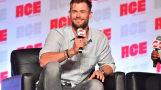 In a Sunday, Oct. 13, 2019 file photo, Chris Hemsworth participates during a Q&A panel on day three at the Ace Comic-Con in Rosemont, Ill. Elton John and Chris Hemsworth are among the celebrities donating big bucks to help aid the efforts for the engulfing wildfires in Australia.