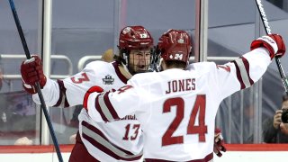 UMass Minutemen players celebrate a goal during the NCAA Division I Men's Ice Hockey Championship game