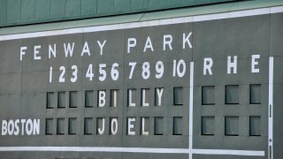 This file photo shows the scoreboard at Fenway Park showing Billy Joel's name.