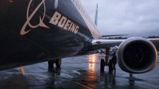 A Boeing 737 MAX sits outside the hangar during a media tour of the Boeing 737 MAX at the Boeing plant in Renton, Washington.