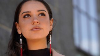 Samantha Maltais, an incoming Harvard Law student, seen May 25, 2021, in New Bedford. When Maltais steps onto Harvard's campus this fall, she'll become the first member of the Aquinnah Wampanoag tribe to attend its prestigious law school. "Coming from a tribal community in its backyard, I'm hyper aware of Harvard's impact," said Maltais, the 24-year-old daughter of her tribe's chairwoman.