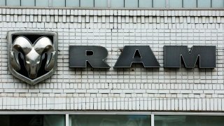 FILE - This Jan. 12, 2017, file photo shows the Ram logo at a Chrysler dealership in Pittsburgh. Fiat Chrysler said Friday, May 28, 2021 that it is recalling more than a half-million heavy-duty Ram trucks to fix a problem that can cause the wheels to fall off.