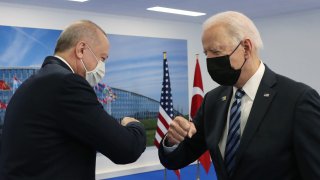 Turkish President Recep Tayyip Erdogan (L) greets US President Joe Biden (R) at the NATO summit at the North Atlantic Treaty Organization (NATO) headquarters in Brussels, on June 14, 2021.