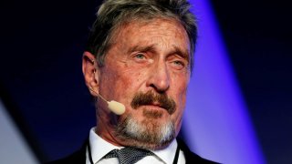 John McAfee, co-founder of McAfee Crypto Team and CEO of Luxcore and founder of McAfee Antivirus, speaks at the Malta Blockchain Summit in St Julian’s, Malta November 1, 2018.