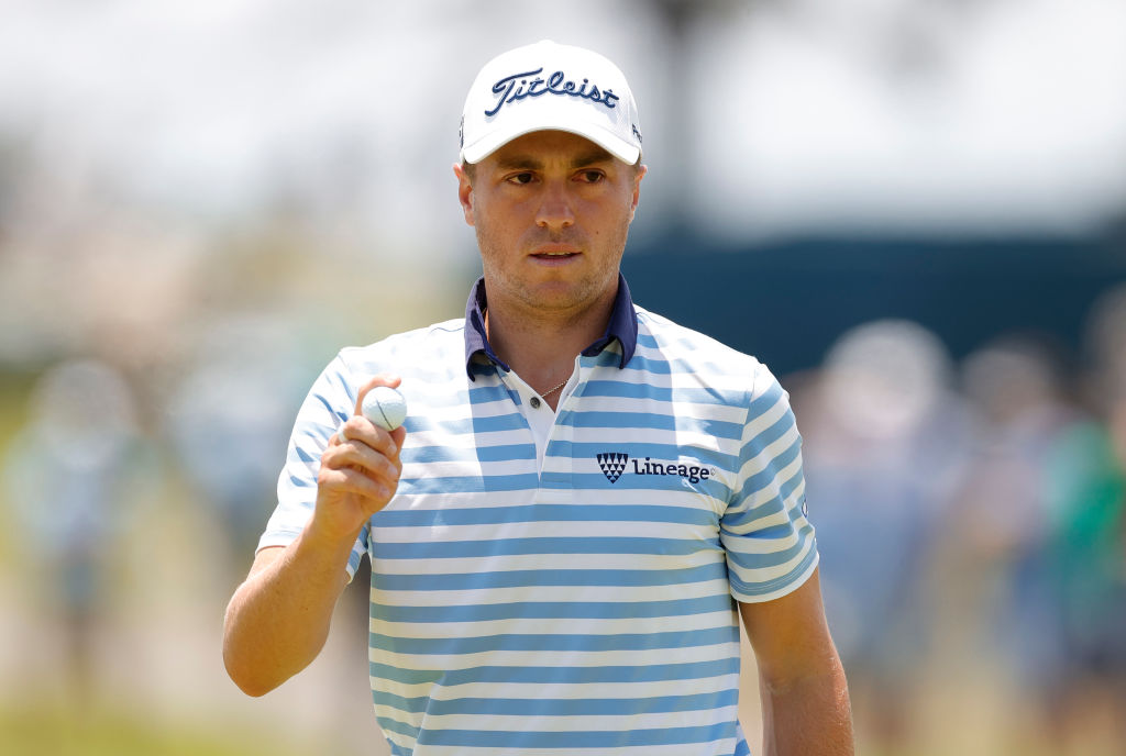 Justin Thomas of the United States waves on the sixth green during the first round of the 2021 U.S. Open at Torrey Pines Golf Course (South Course) on June 17, 2021 in San Diego, California.