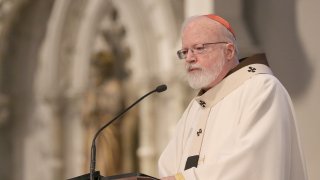 This May 21, 2016, file photo shows Cardinal Sean O'Malley outside the Cathedral of the Holy Cross in Boston.