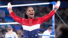 Jordan Chiles, of the United States, celebrates her performance on the uneven bars during the artistic gymnastics women's final at the 2020 Summer Olympics, Tuesday, July 27, 2021, in Tokyo.