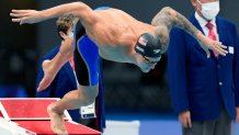 Caeleb Dressel of the United States starts in his men's 100-meter freestyle semifinal at the 2020 Summer Olympics, Wednesday, July 28, 2021, in Tokyo, Japan.