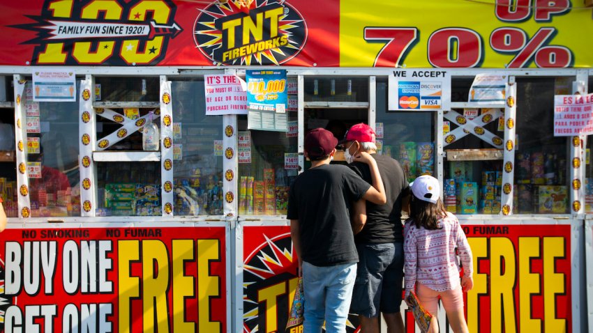 A family purchases fireworks.