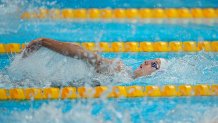 Regan Smith competes during the women's 100m backstroke preliminaries at the Tokyo Aquatics Center, July 25, 2021, in Tokyo.